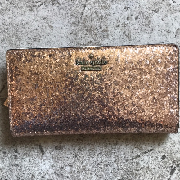kate spade Handbags - Kate Spade Rose Gold Wallet
